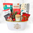 Load image into Gallery viewer, Gift basket with holiday-themed items including coffee, tea, and a candle on a white background.